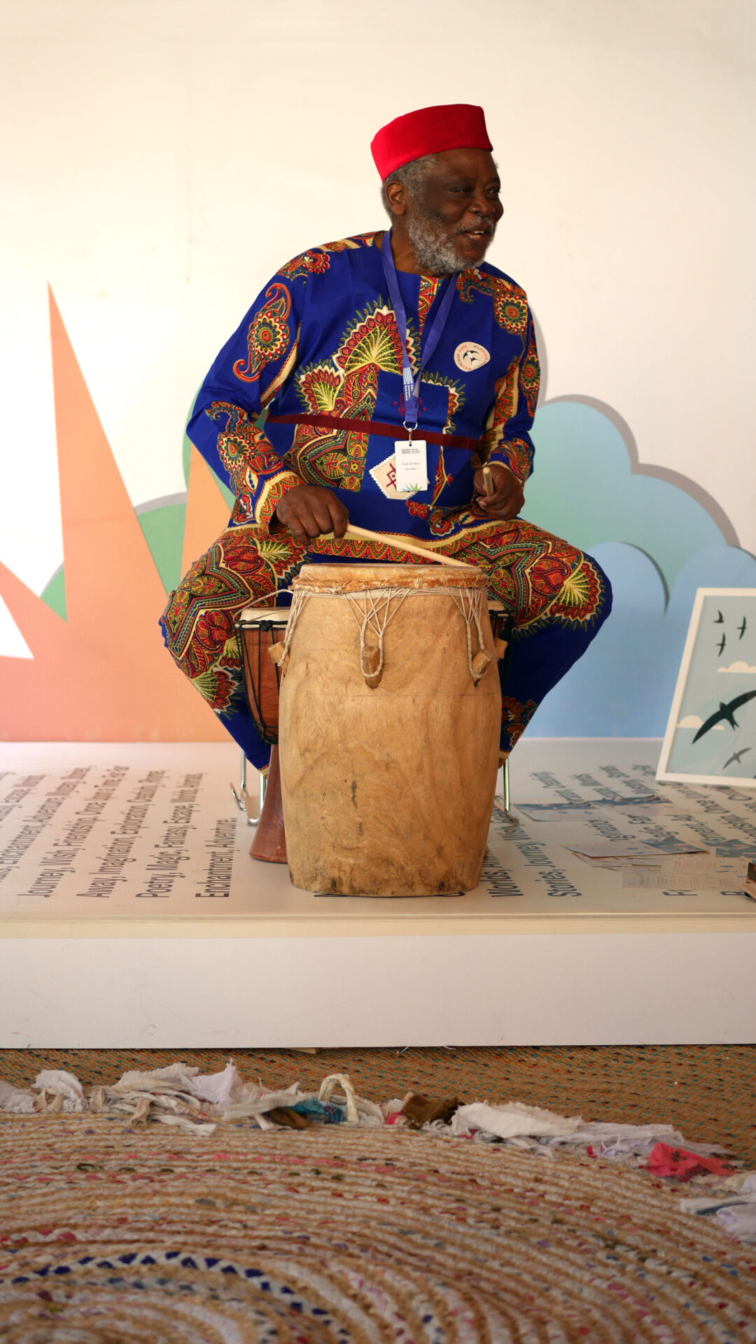 Gift Amu leading children in a participatory song at the Edinburgh International Book Festival.